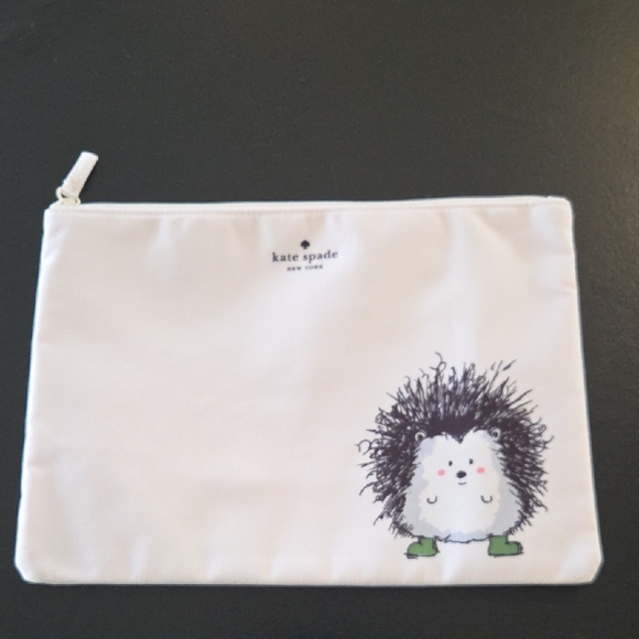 kate spade Handbags - NWOT Kate Spade Cream Pouch with Hedgehog Motif